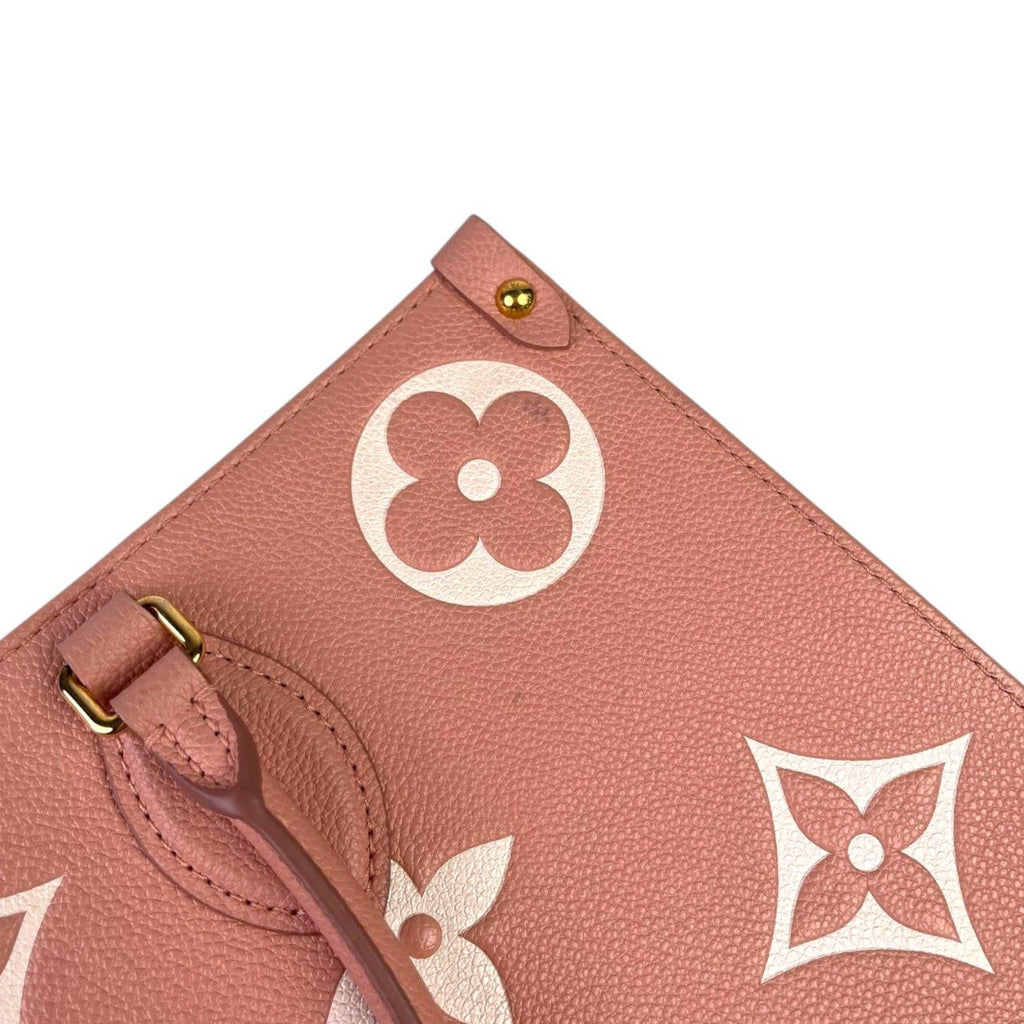 LV On the go MM Bicolour Monogram Empreinte Leather